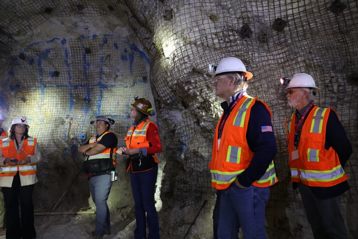 Kray Luxbacher and crowd at the San Xavier Underground Mining Laboratory